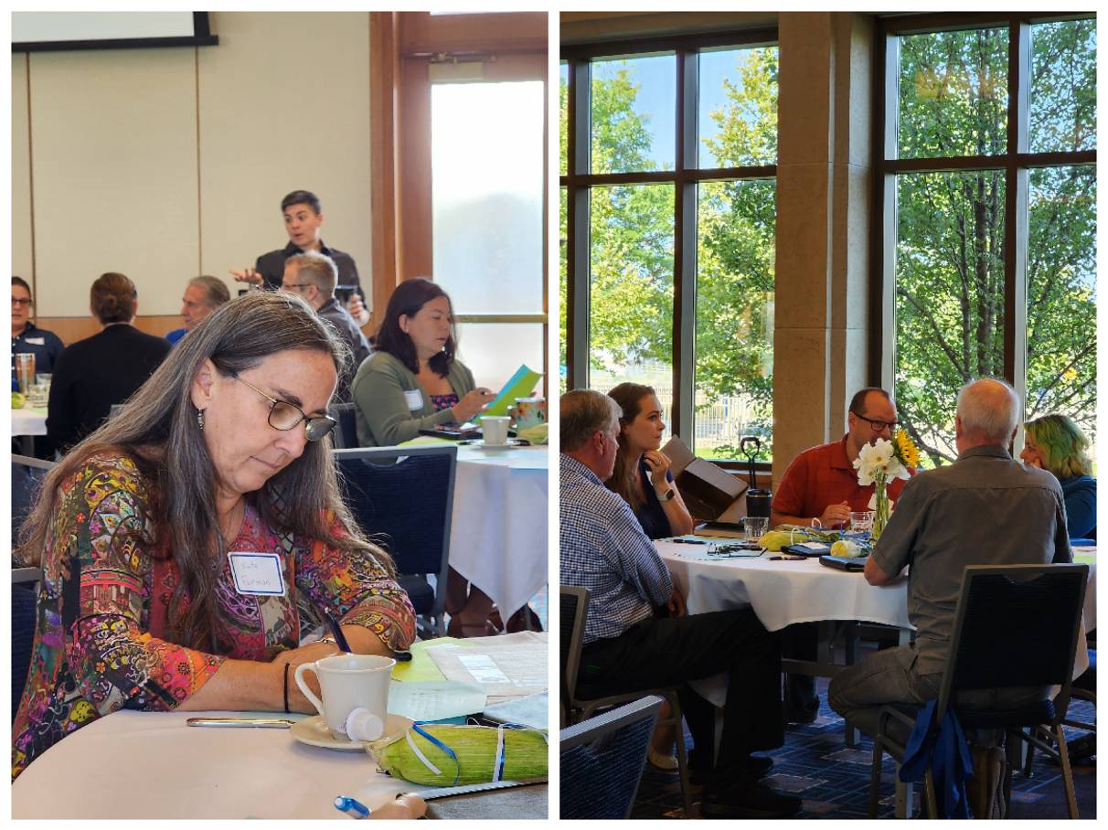 People talking at their tables during the startup meeting